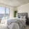 Nob Hill, San Francisco, CA, Apartments - Etta Apartments - Bedroom with Plush Carpeting, Oversized Windows, and a Desk Area